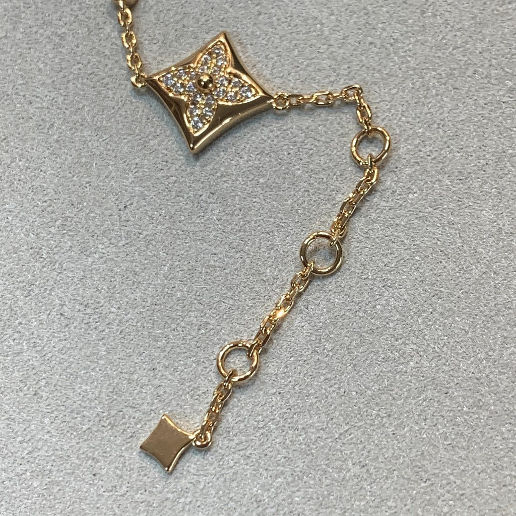 ¡®Imperial¡¯STAR AND SUN 4 MOTIFS GOLD DIAMONDS BRACELET