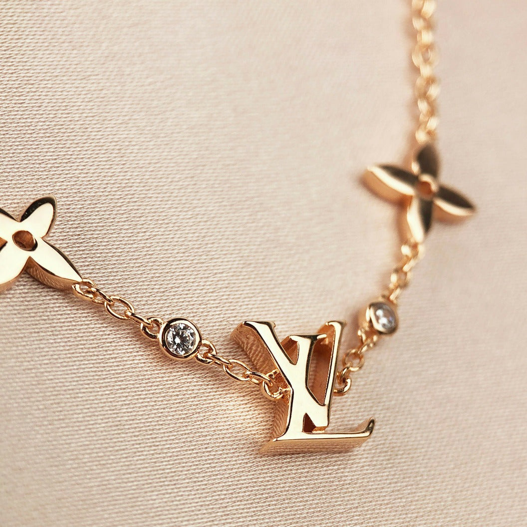 ¡®Imperial¡¯STAR AND SUN 7 MOTIFS GOLD BRACELET