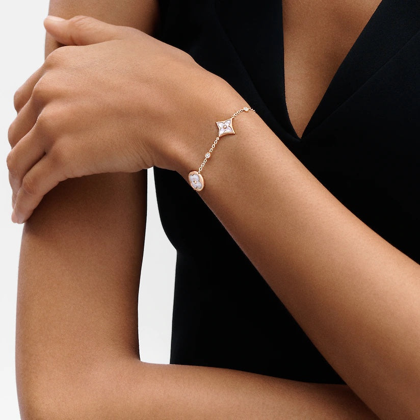 ¡®Imperial¡¯STAR AND SUN 4 MOTIF WHITE MOP PINK GOLD BRACELET